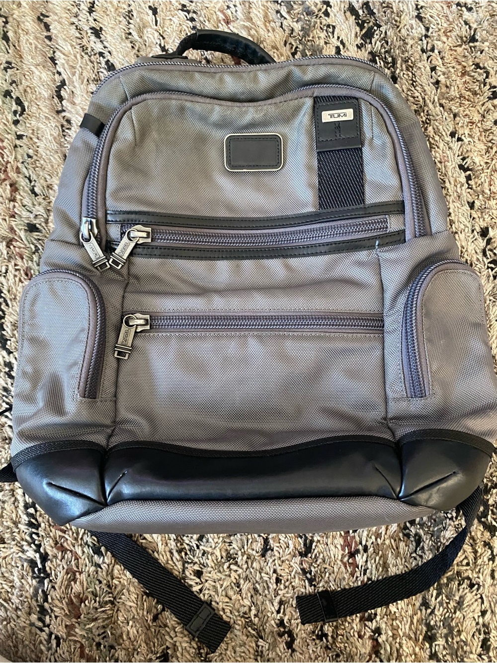 Tumi Gray and Black Men's Backpack with Multiple Zip Pockets